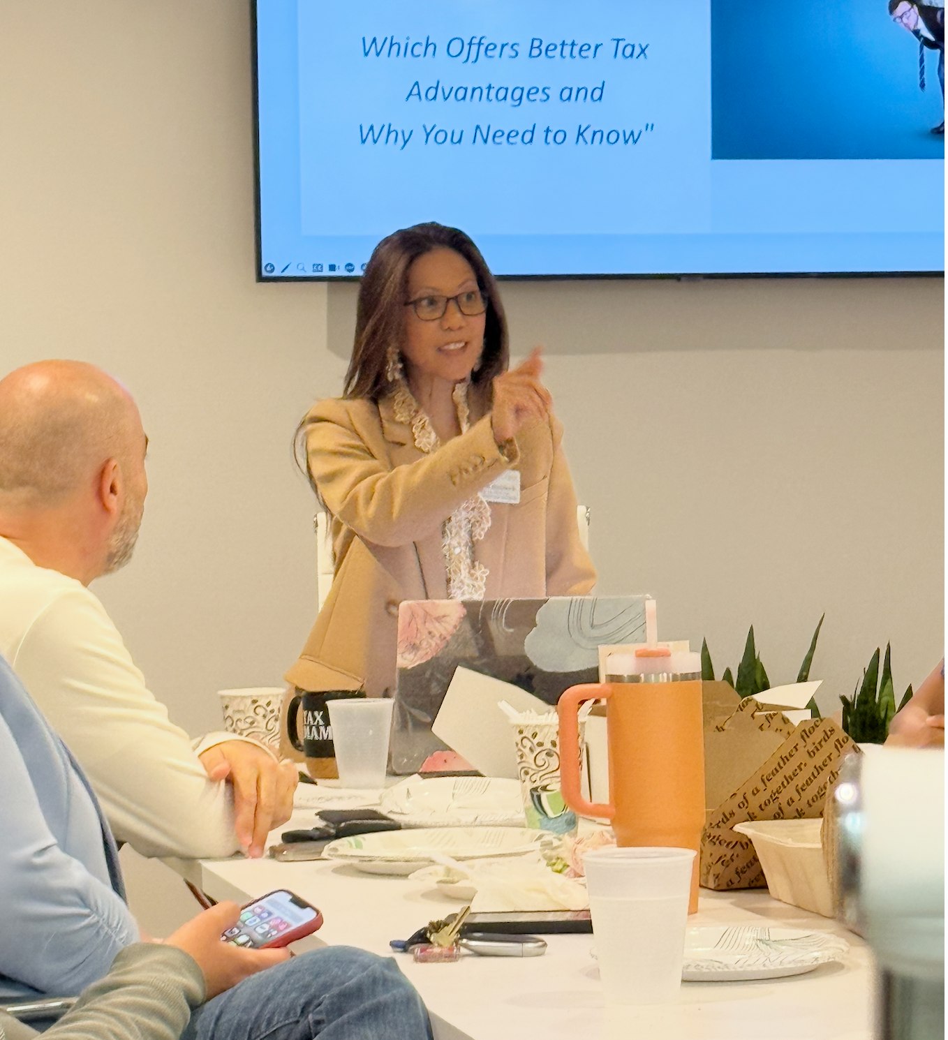 Alexis leading a tax strategy session, teaching business owners how to save on taxes